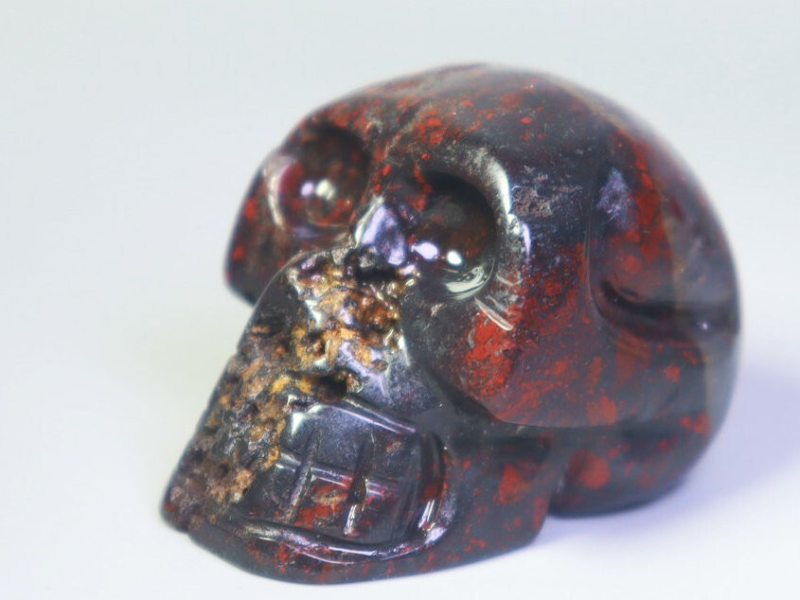 Natural Red Flower Fort Quartz Crystal Palm Stone Carved Skull Healing - China