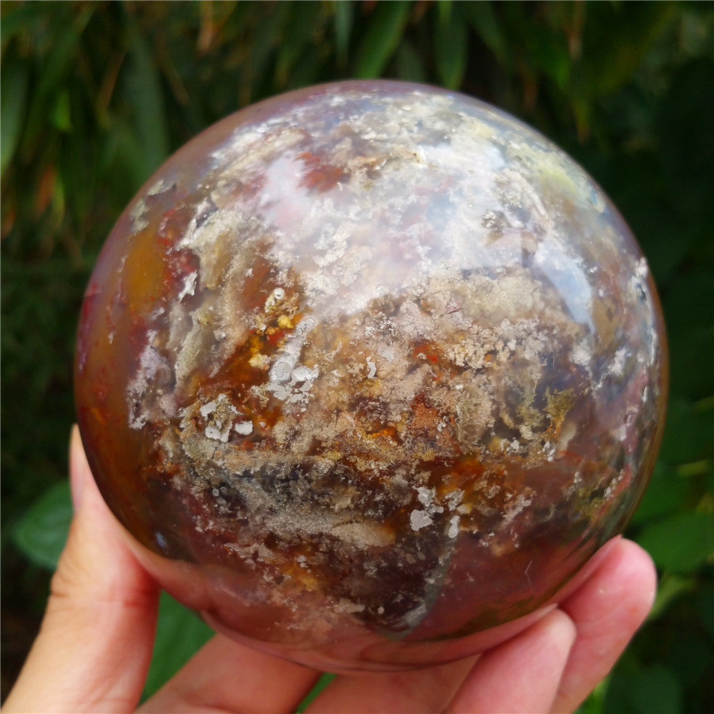 Crystal carved ball of Ocean Jasper