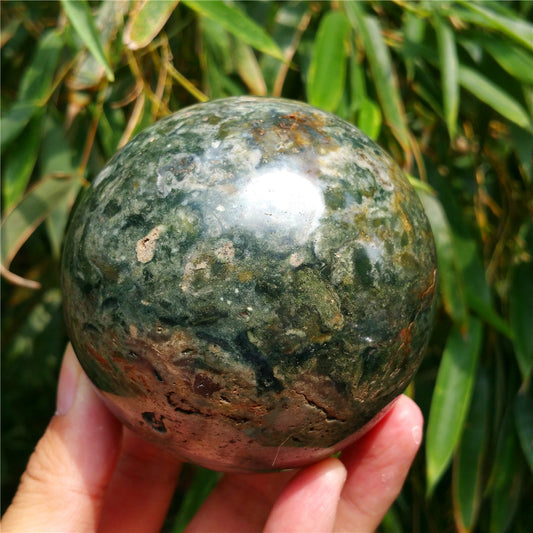 Crystal carved ball of Ocean Jasper