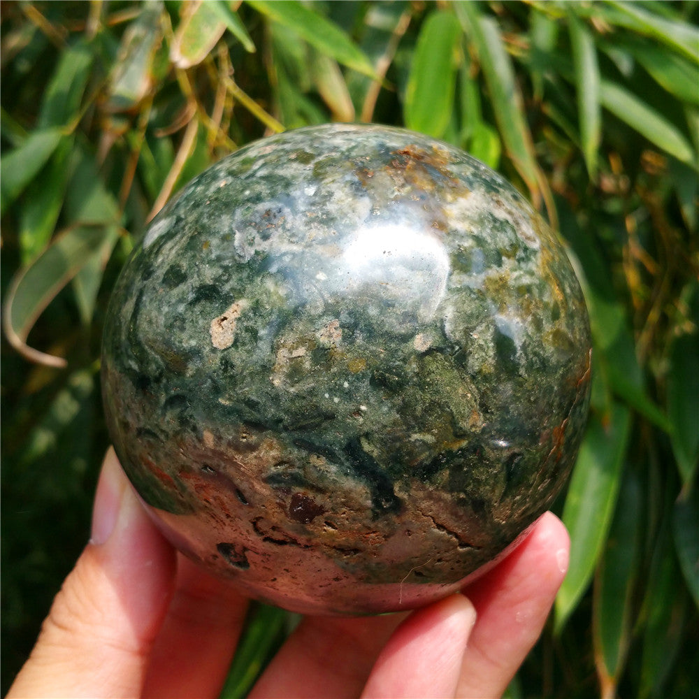 Crystal carved ball of Ocean Jasper
