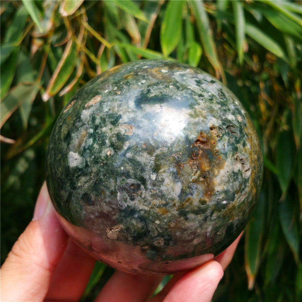Crystal carved ball of Ocean Jasper