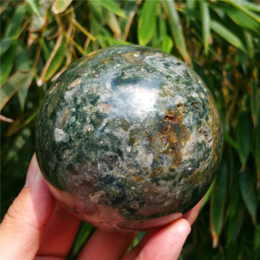 Crystal carved ball of Ocean Jasper