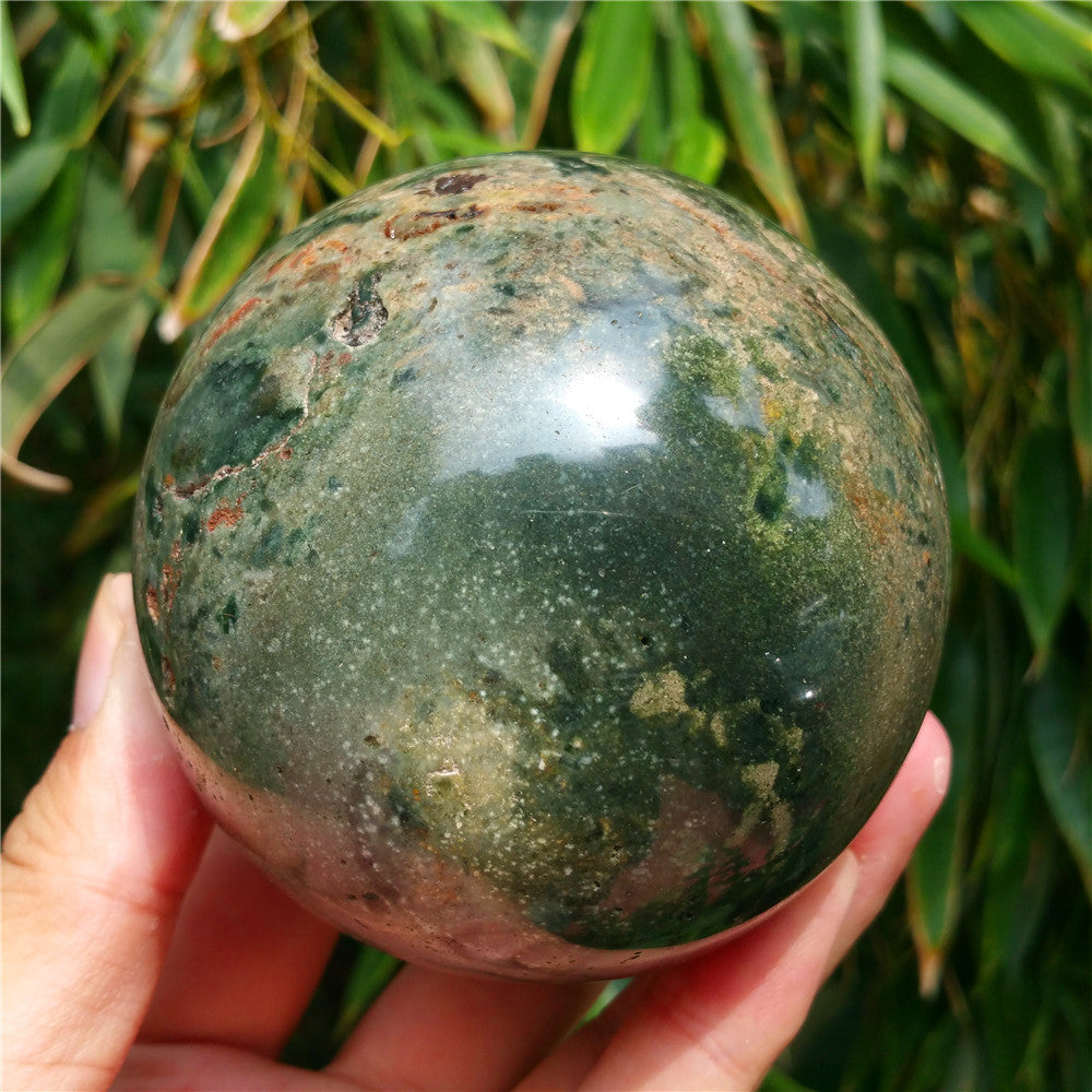 Crystal carved ball of Ocean Jasper