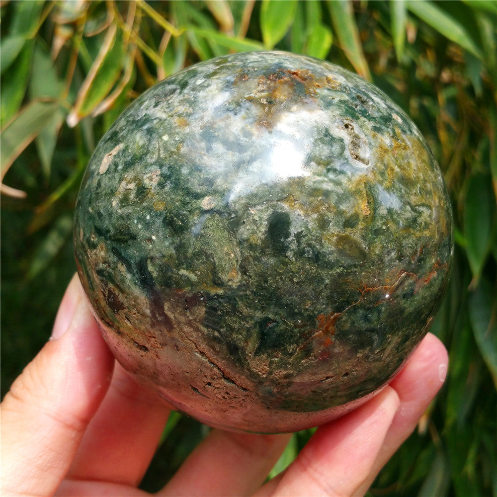Crystal carved ball of Ocean Jasper