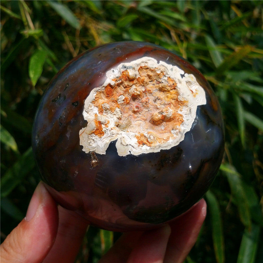 Crystal carved ball of Ocean Jasper