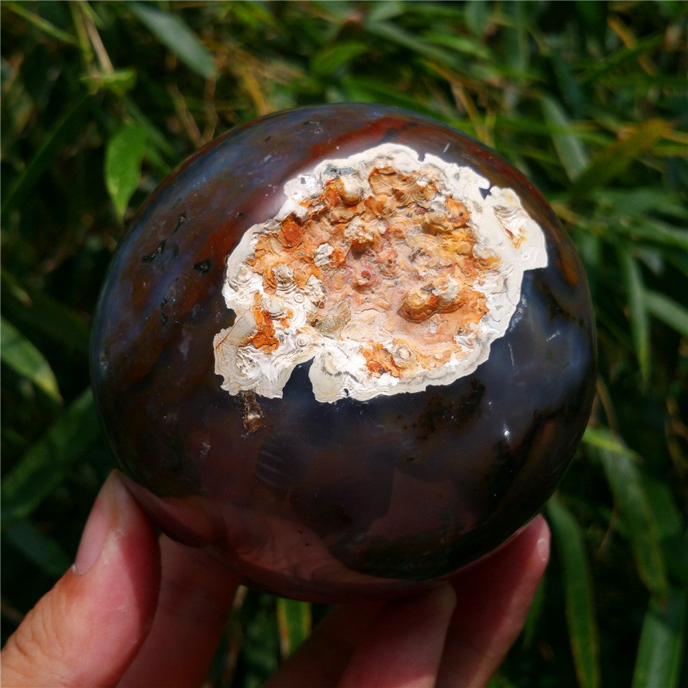 Crystal carved ball of Ocean Jasper