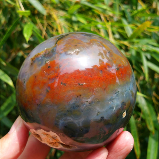 Crystal carved ball of Ocean Jasper