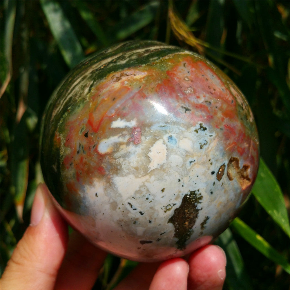 Crystal carved ball of Ocean Jasper
