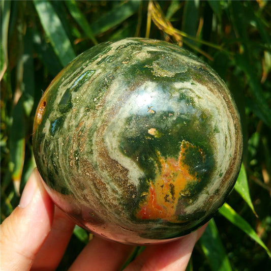 Crystal carved ball of Ocean Jasper