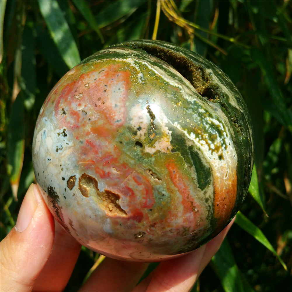 Crystal carved ball of Ocean Jasper