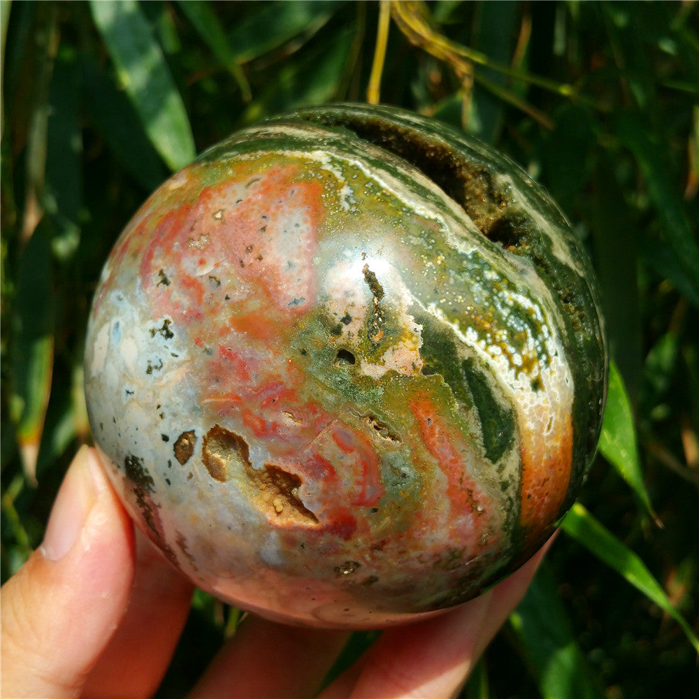 Crystal carved ball of Ocean Jasper