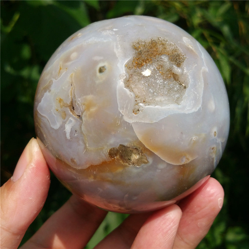 Crystal carved ball of Ocean Jasper