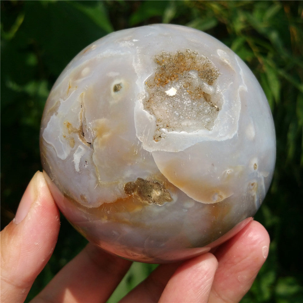 Crystal carved ball of Ocean Jasper