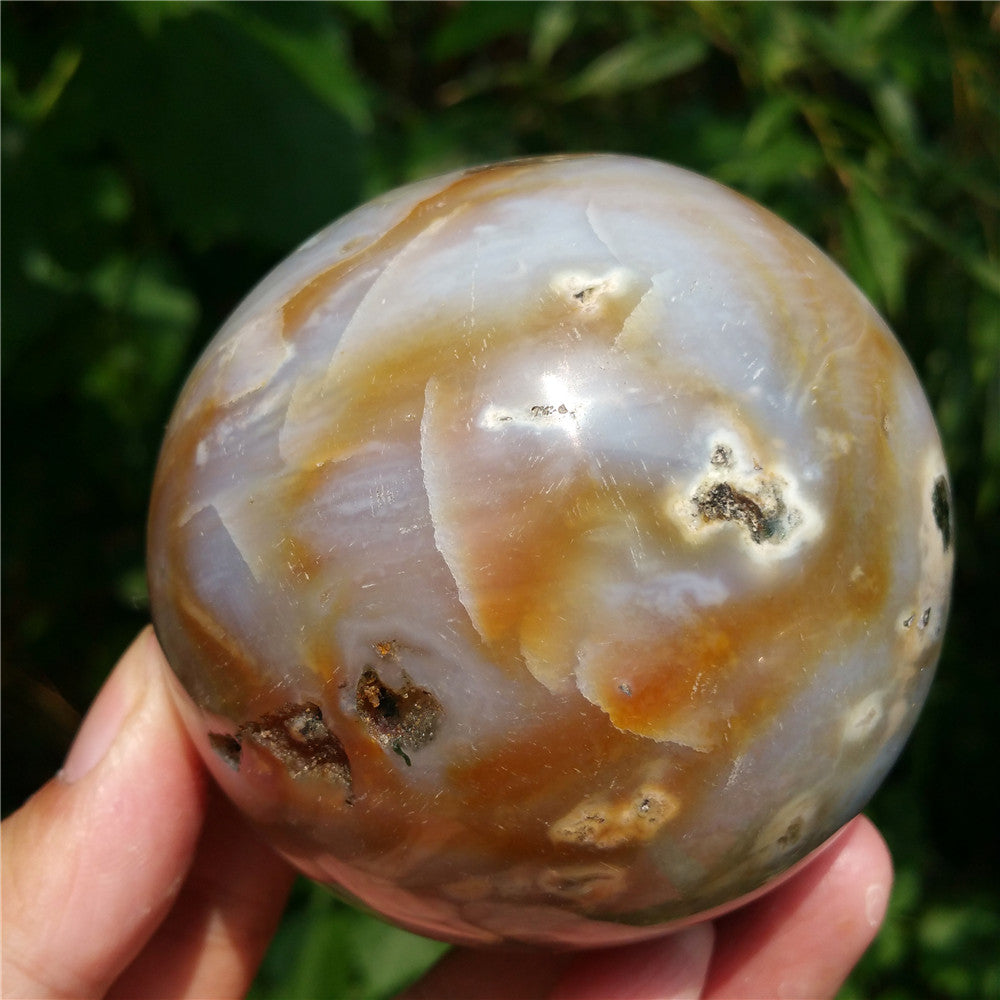 Crystal carved ball of Ocean Jasper