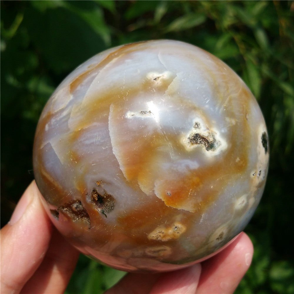 Crystal carved ball of Ocean Jasper