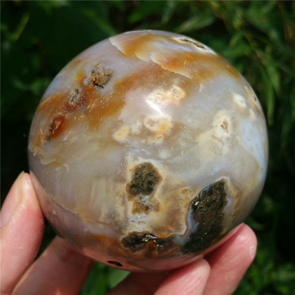 Crystal carved ball of Ocean Jasper