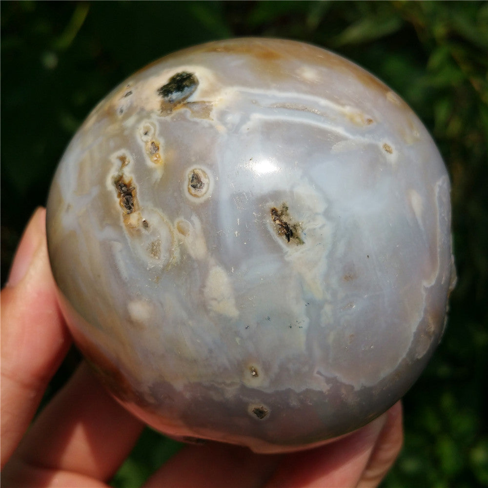 Crystal carved ball of Ocean Jasper