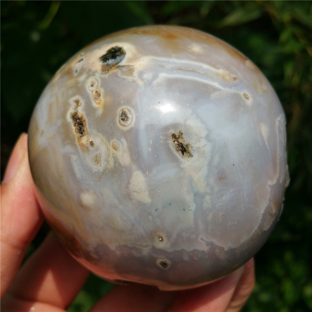 Crystal carved ball of Ocean Jasper