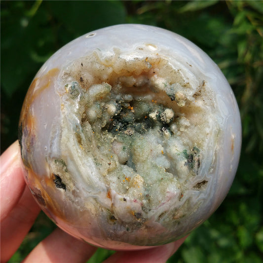 Crystal carved ball of Ocean Jasper
