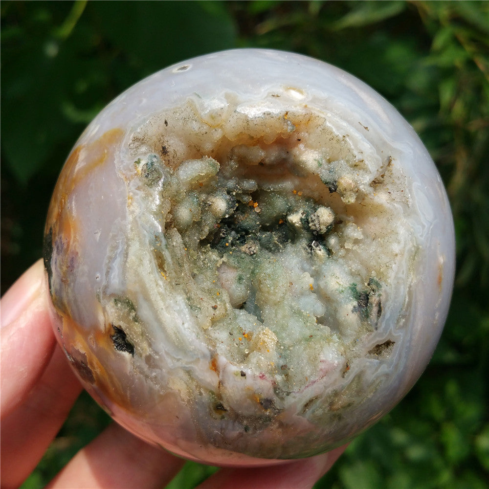 Crystal carved ball of Ocean Jasper