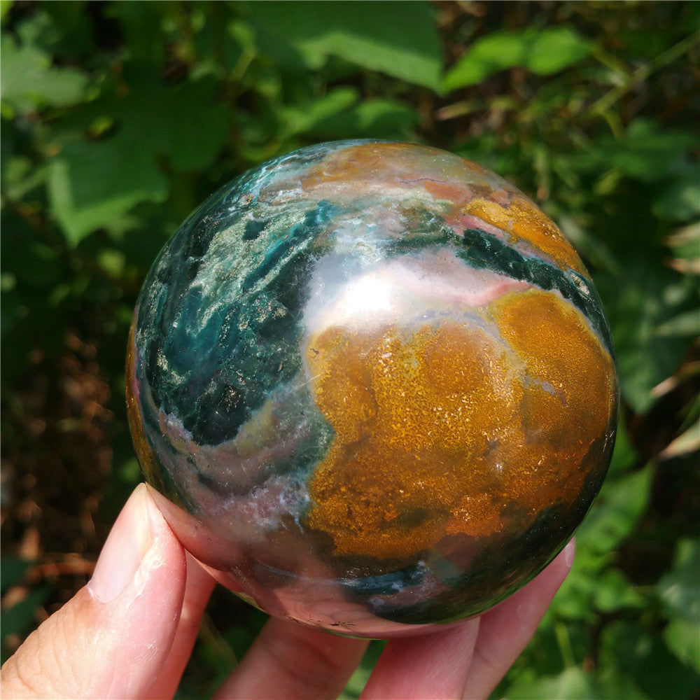 Crystal carved ball of Ocean Jasper
