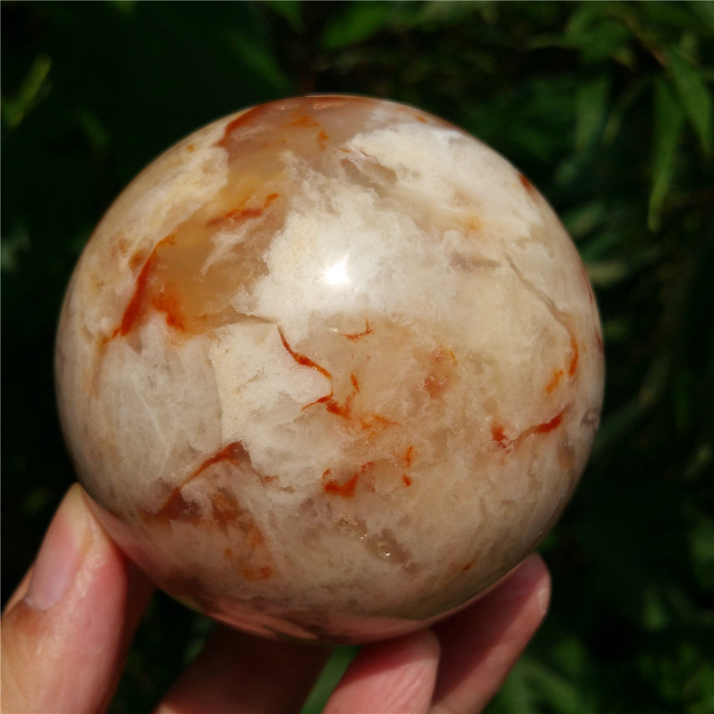 Crystal carved ball of Ocean Jasper