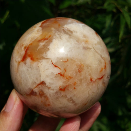 Crystal carved ball of Ocean Jasper