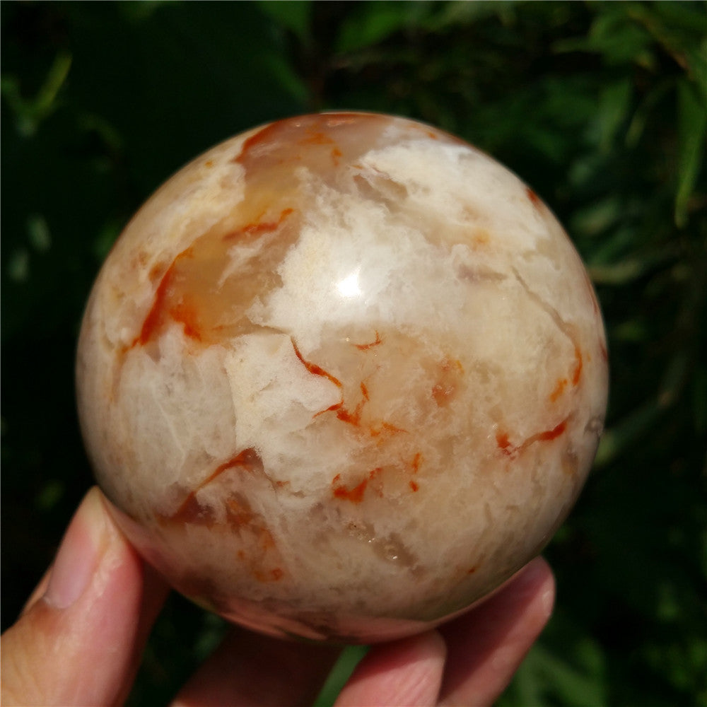 Crystal carved ball of Ocean Jasper