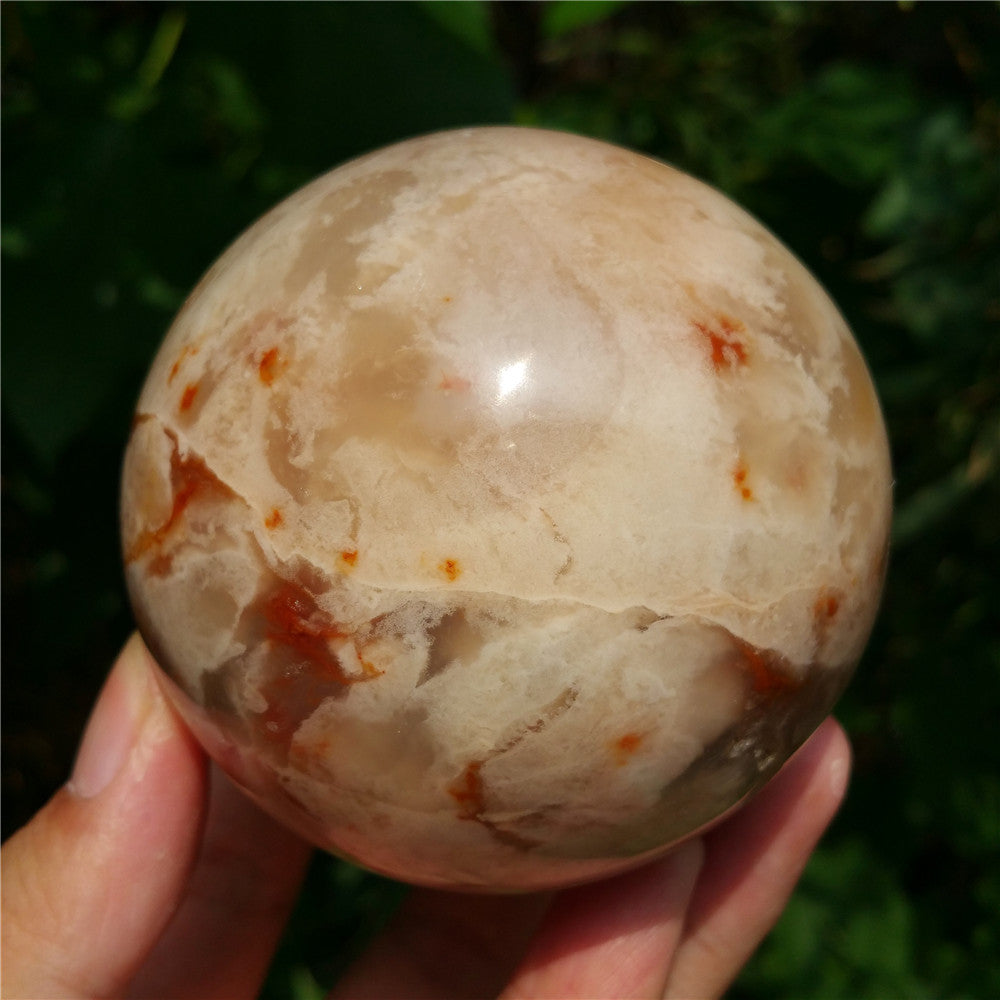 Crystal carved ball of Ocean Jasper