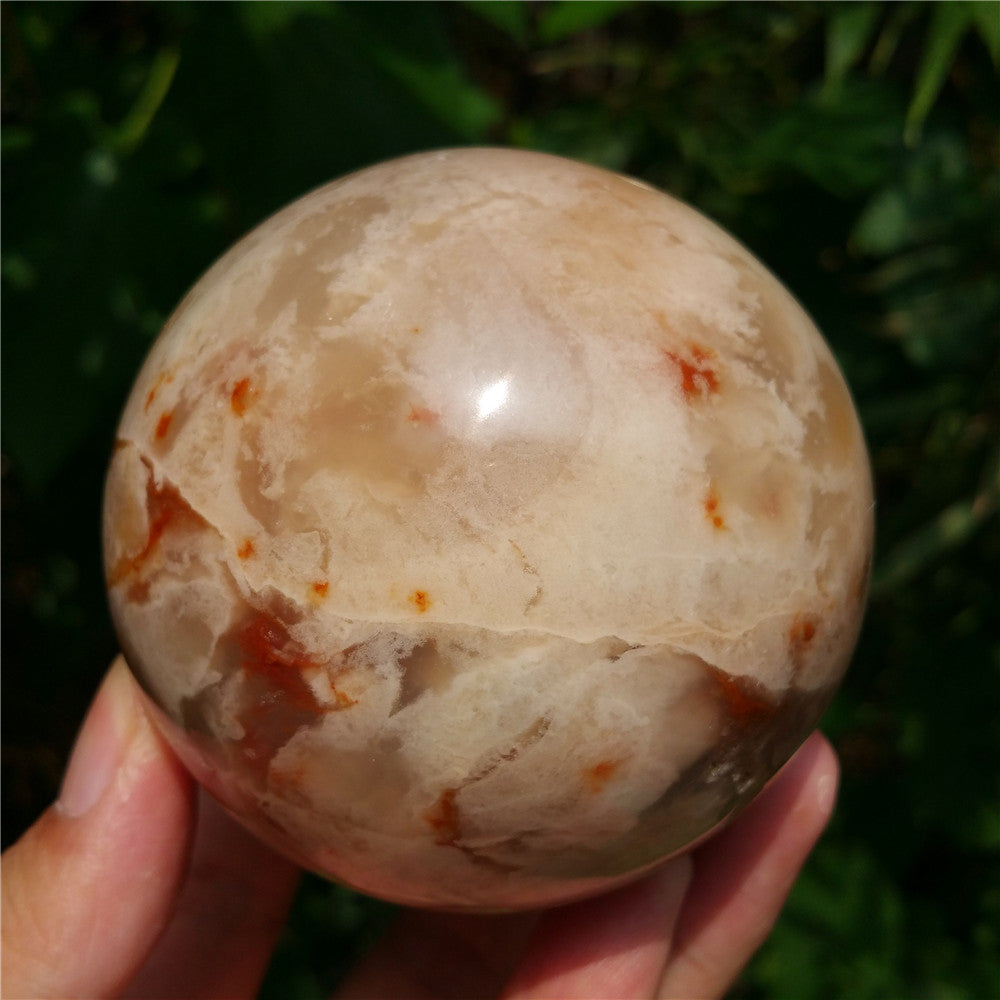 Crystal carved ball of Ocean Jasper