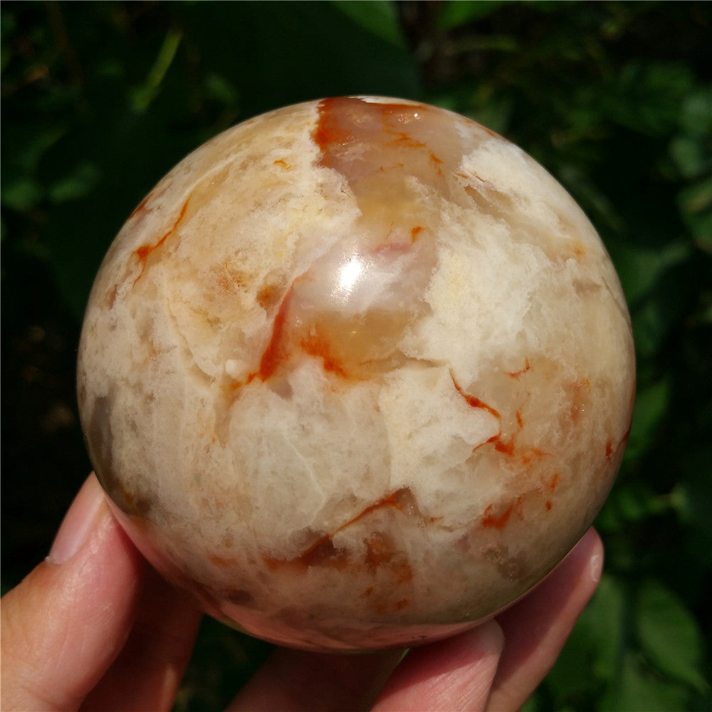 Crystal carved ball of Ocean Jasper