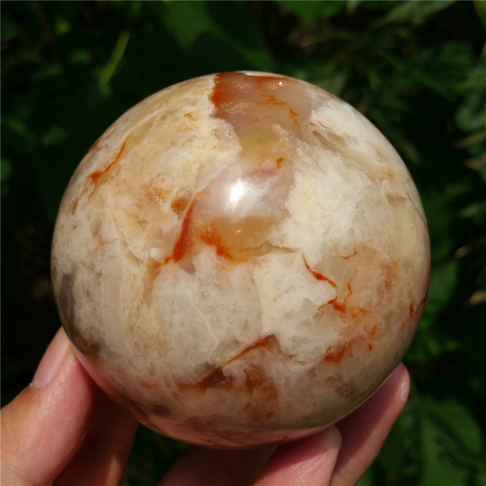 Crystal carved ball of Ocean Jasper