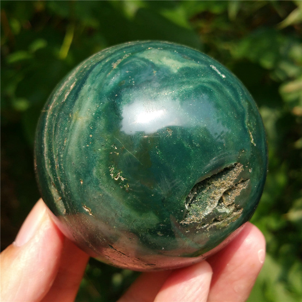 Crystal carved ball of Ocean Jasper
