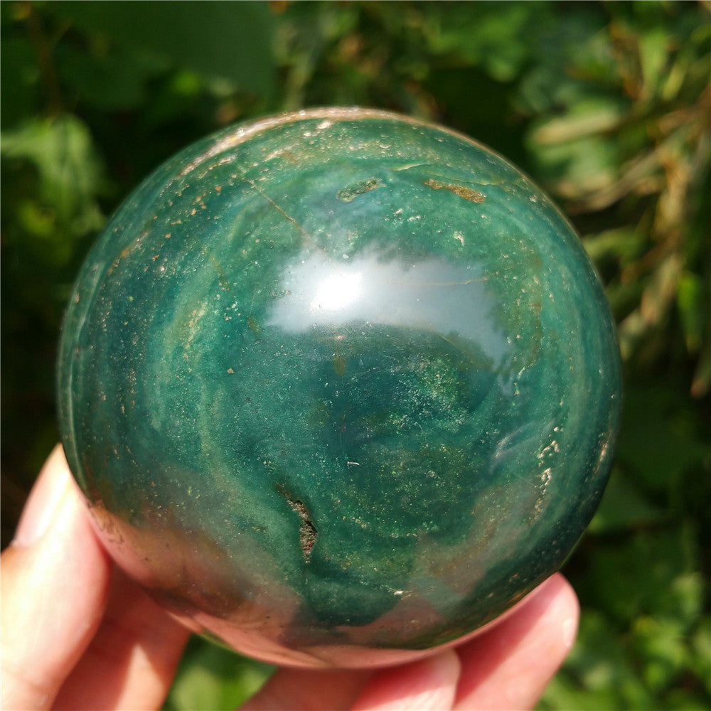 Crystal carved ball of Ocean Jasper