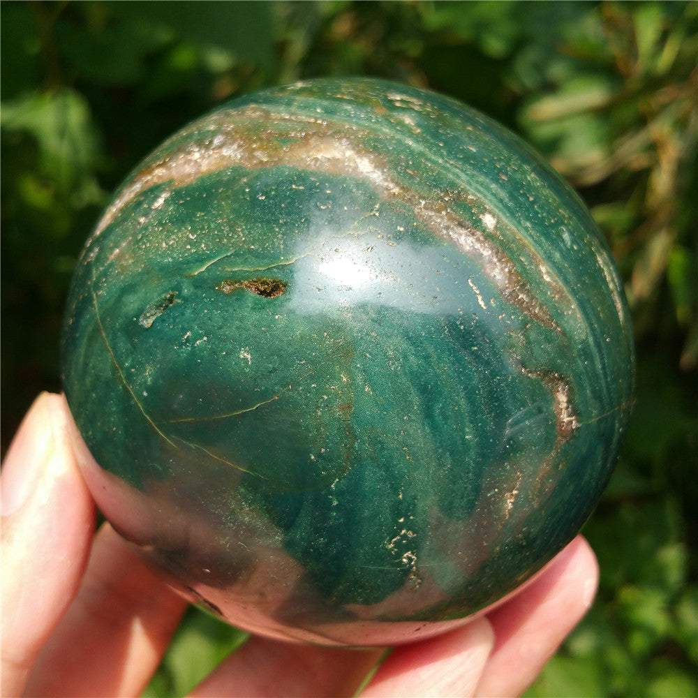 Crystal carved ball of Ocean Jasper