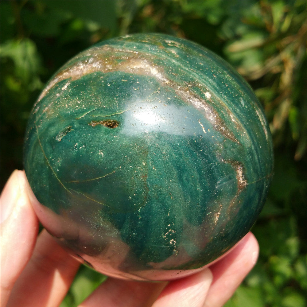 Crystal carved ball of Ocean Jasper