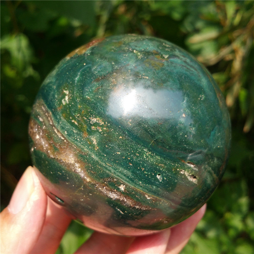 Crystal carved ball of Ocean Jasper