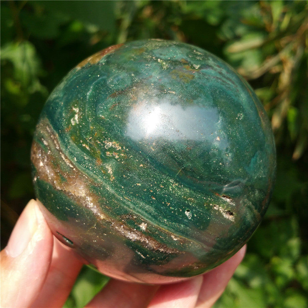 Crystal carved ball of Ocean Jasper