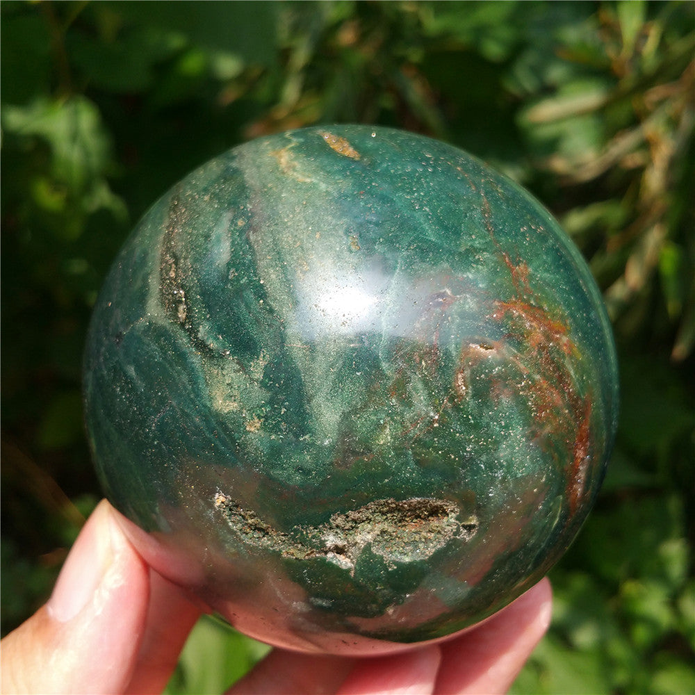 Crystal carved ball of Ocean Jasper