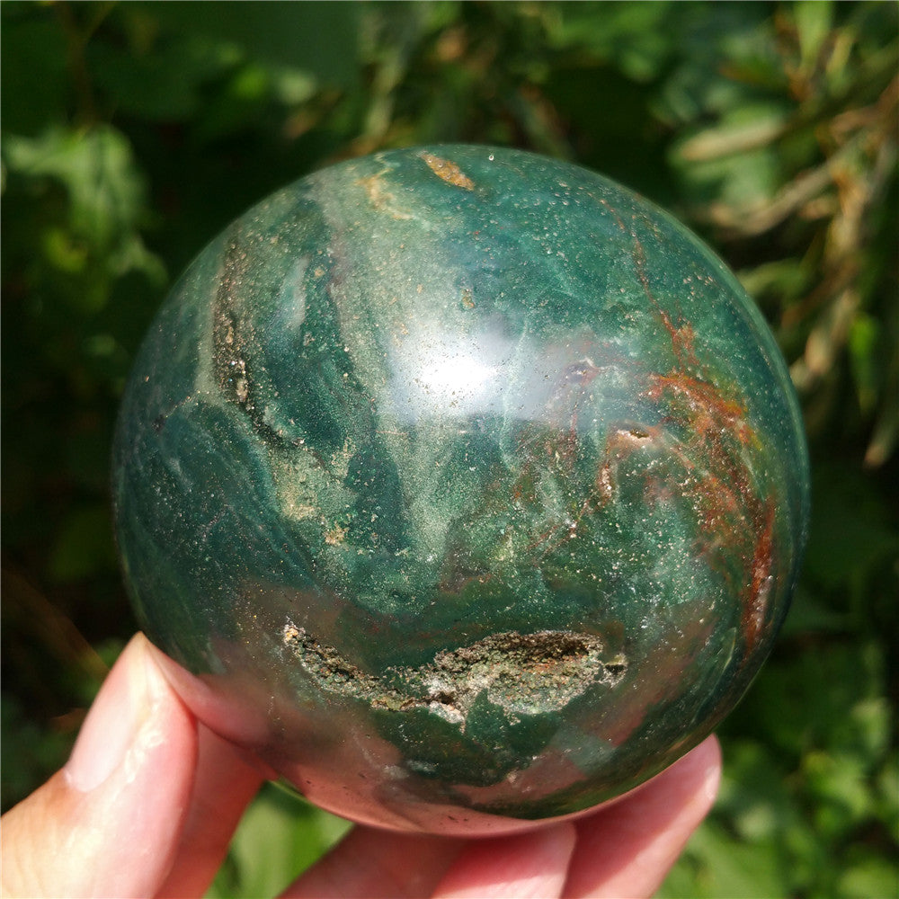 Crystal carved ball of Ocean Jasper