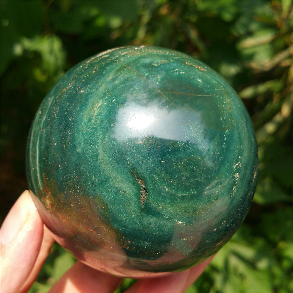 Crystal carved ball of Ocean Jasper