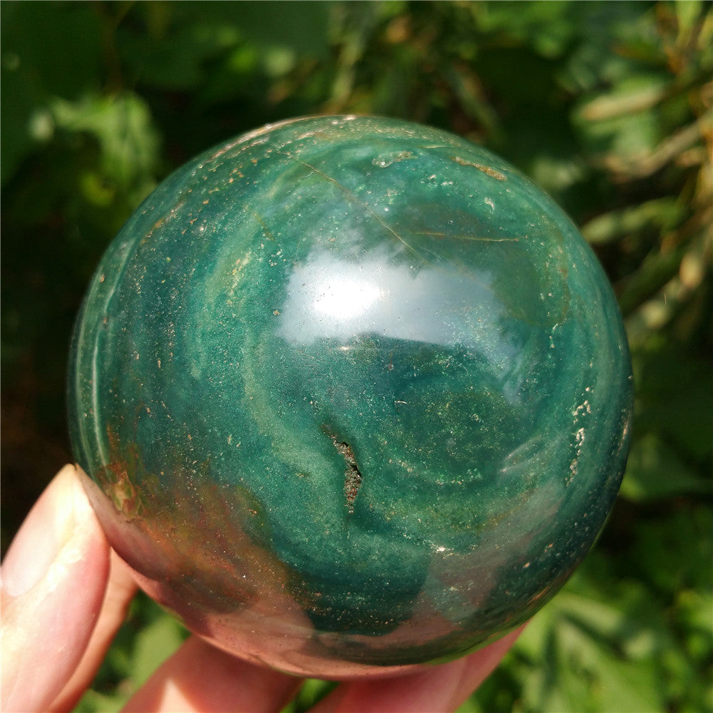 Crystal carved ball of Ocean Jasper