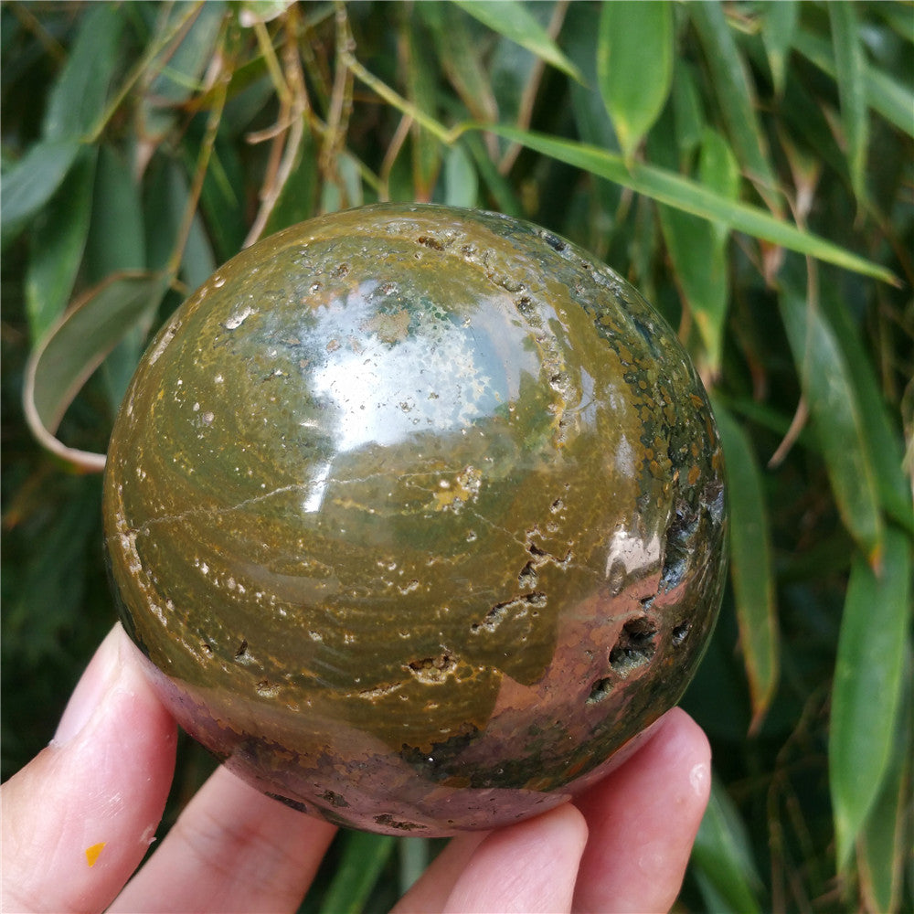 Crystal carved ball of Ocean Jasper  #702626