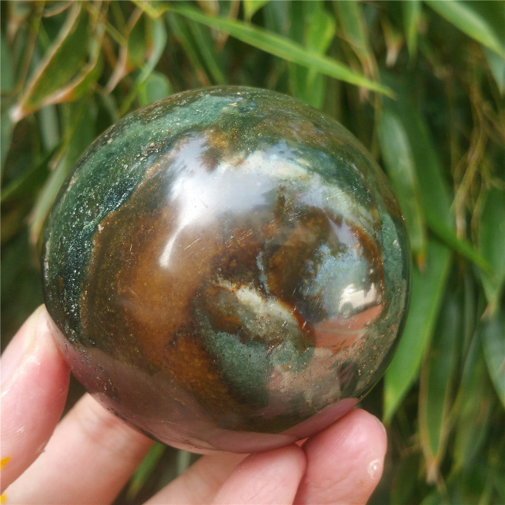 Crystal carved ball of Ocean Jasper