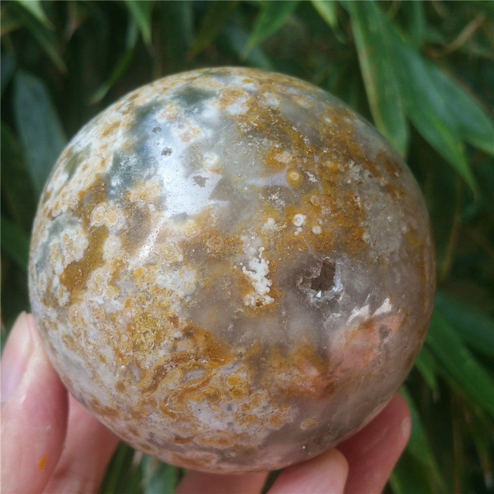 Crystal carved ball of Ocean Jasper