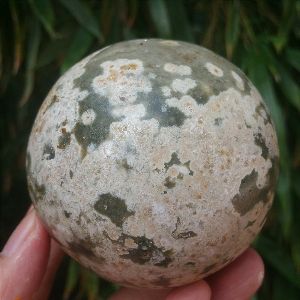 Crystal carved ball of Ocean Jasper