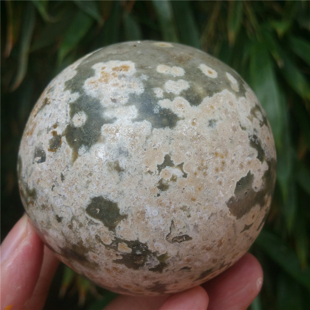 Crystal carved ball of Ocean Jasper