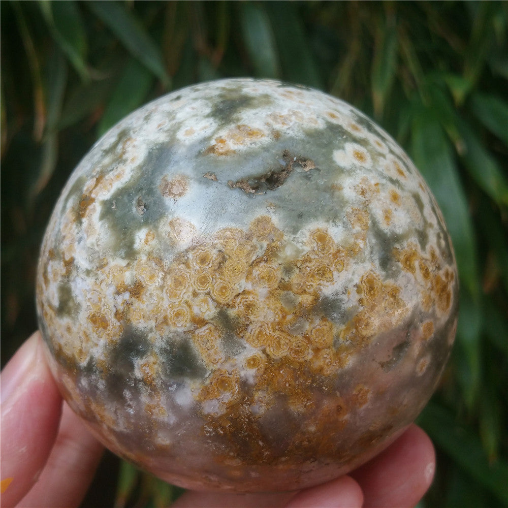 Crystal carved ball of Ocean Jasper