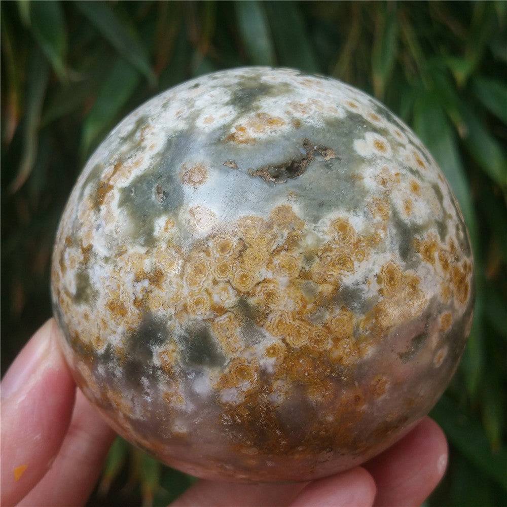 Crystal carved ball of Ocean Jasper