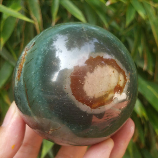 Crystal carved ball of Ocean Jasper